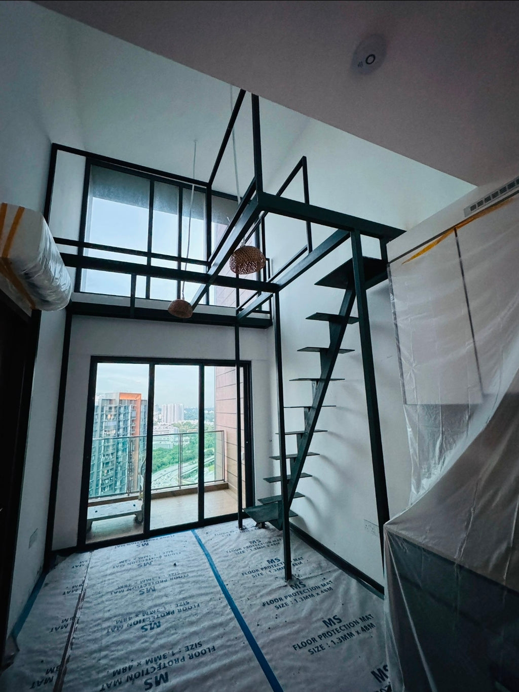 Mild Steel Mezzanine & Lami-Tempered Glass Railing | Queensway Condo Living Room