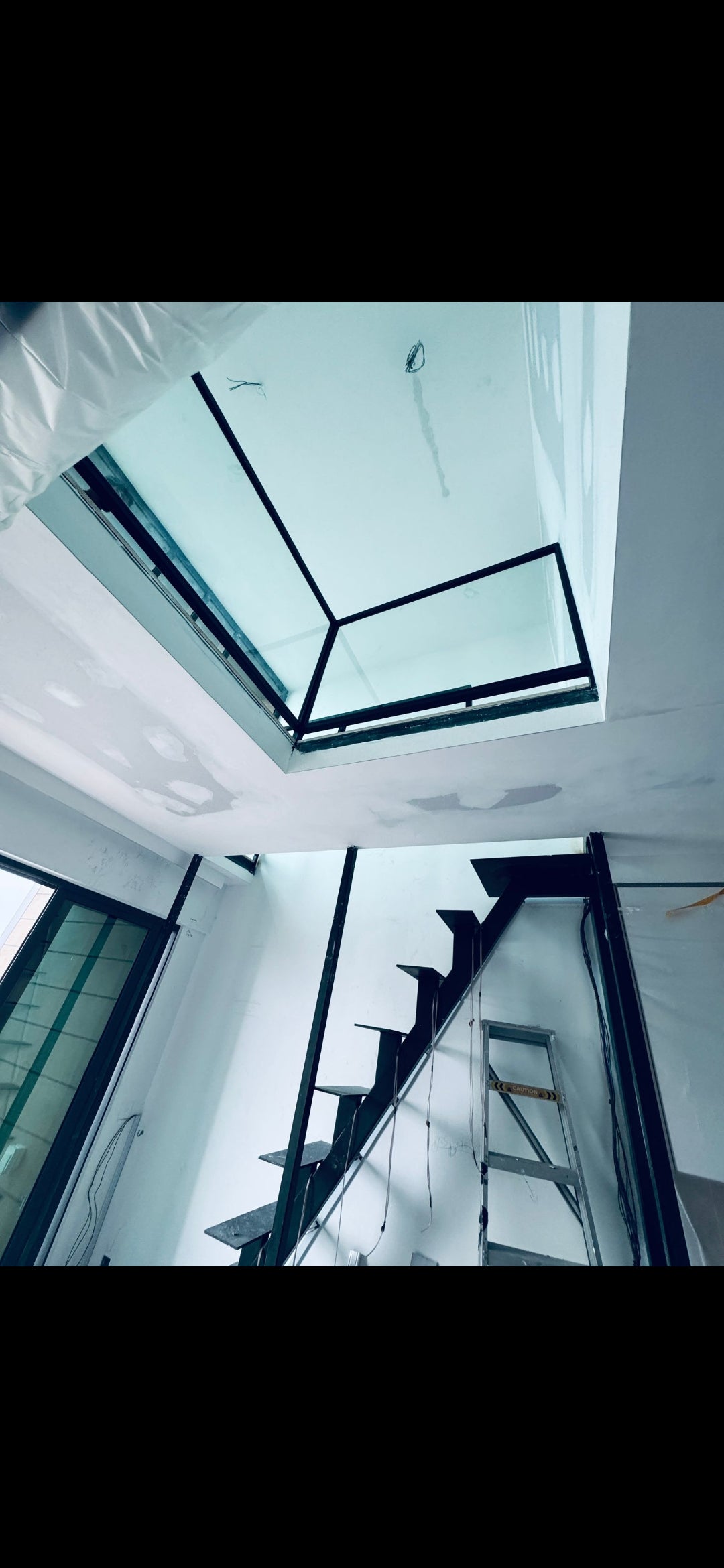 Mild Steel Mezzanine & Lami-Tempered Glass Railing | Queensway Condo Living Room