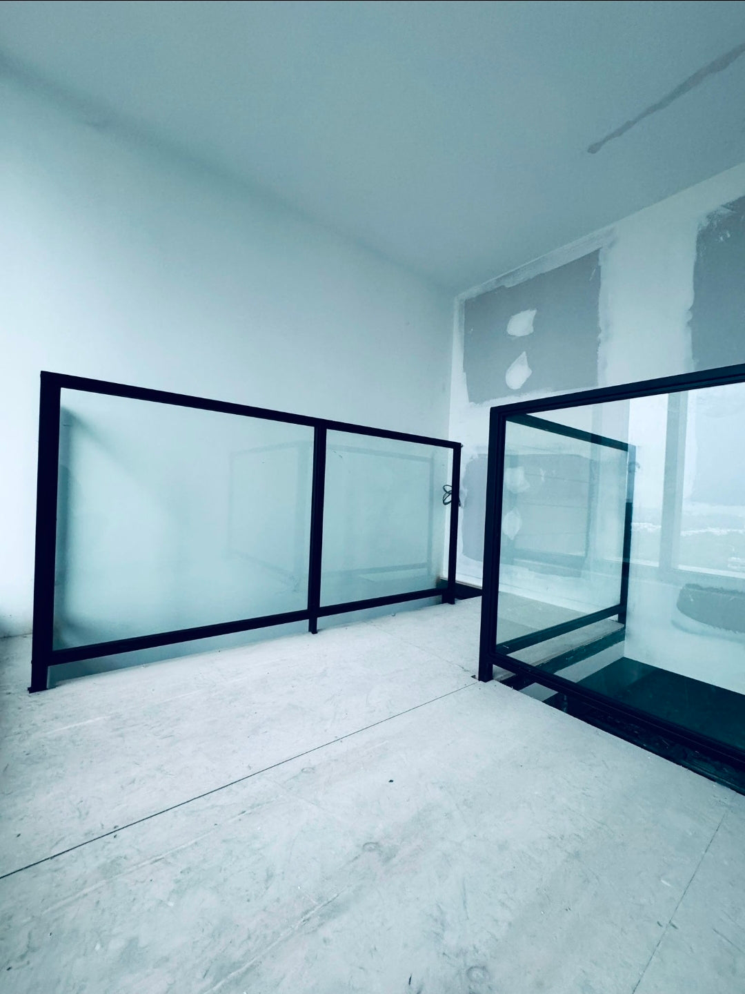 Mild Steel Mezzanine & Lami-Tempered Glass Railing | Queensway Condo Living Room