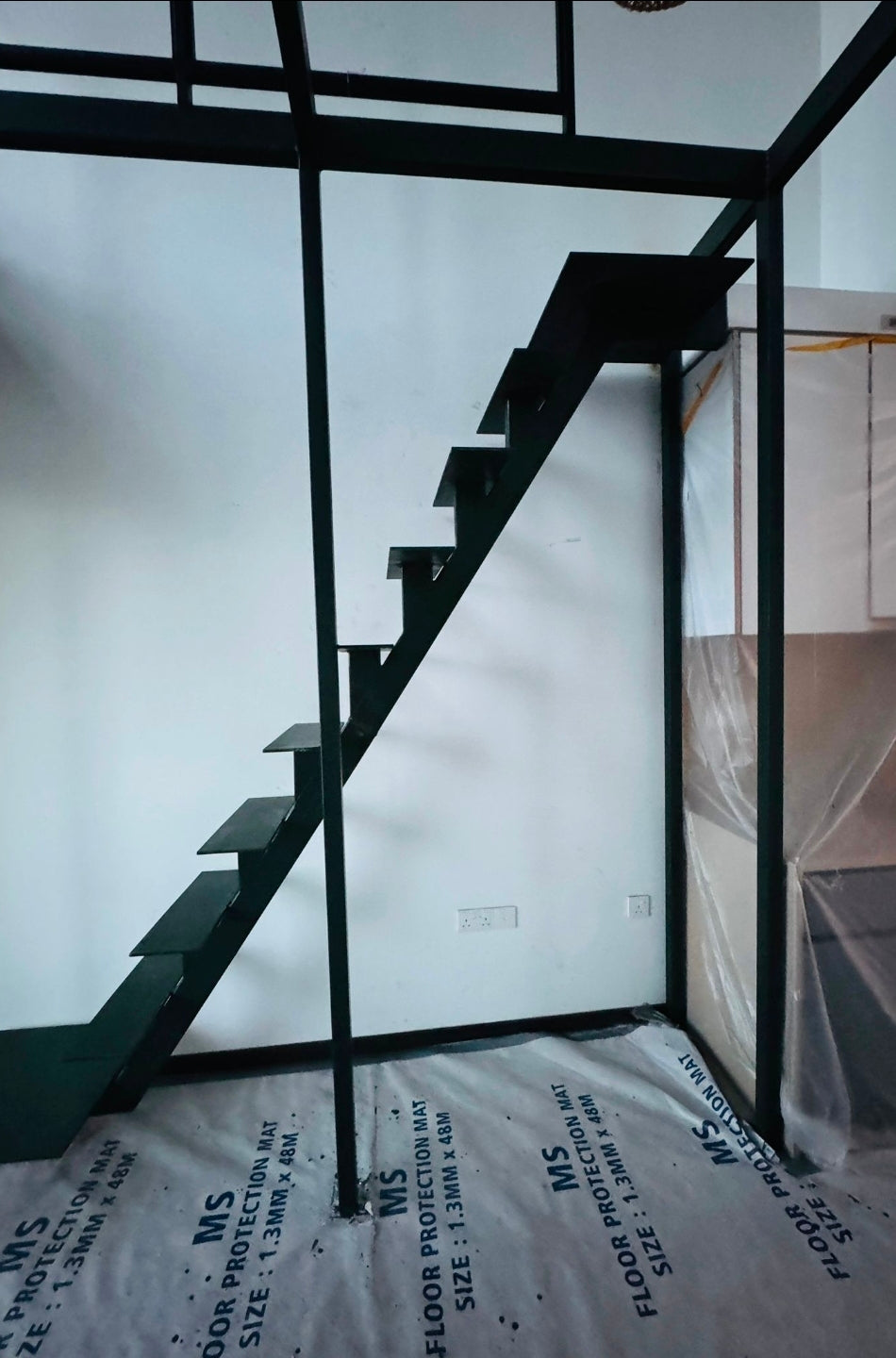 Mild Steel Mezzanine & Lami-Tempered Glass Railing | Queensway Condo Living Room