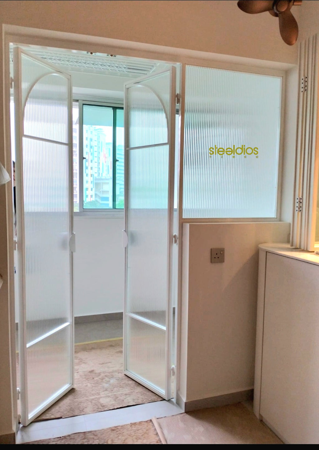 Mild steel glass door series 15 - Bi Fold glass door (Kitchen Entrance Door)